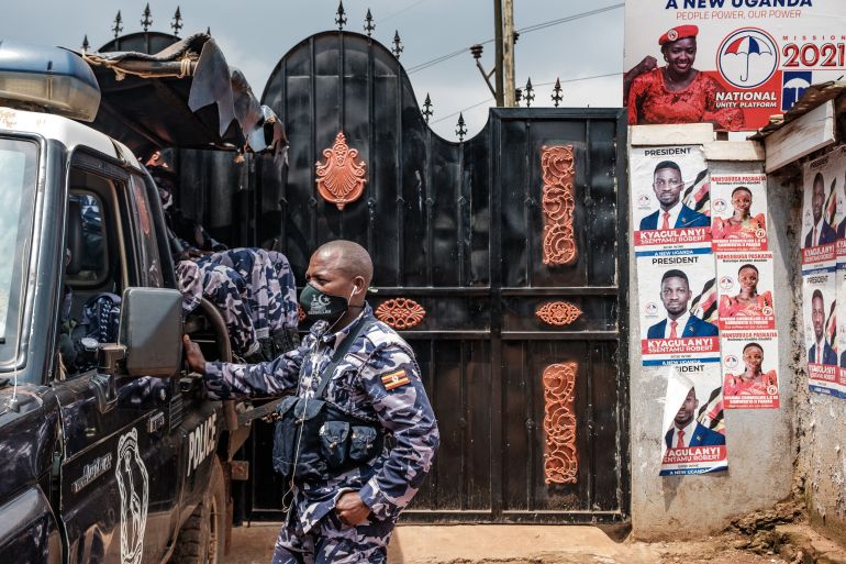 A police car outside the headquarters of the Uganda's opposition party National Unity Platform