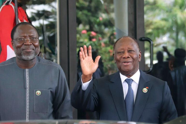 Omar Touray, president of the ECOWAS Commission, left, and Ivory Coast President Alassane Ouattara