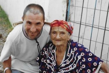 Rabah, with his aunt, Kamira, in the Algerian province of Jijel in 2005