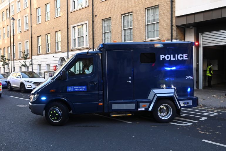 A police prison van leaves Westminster Magistrates' Court