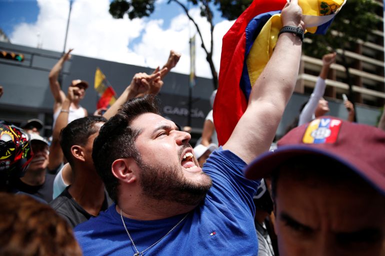 Demonstrators rally against Venezuelan President Nicolas Maduro's re-election