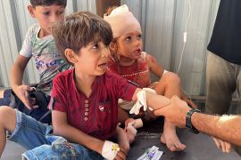 Palestinian children injured by Israeli attacks are brought to al-Ahli Arab Hospital for treatment in Gaza City, August 06, 2024 [Hamza ZH Qraiqea/Anadolu]