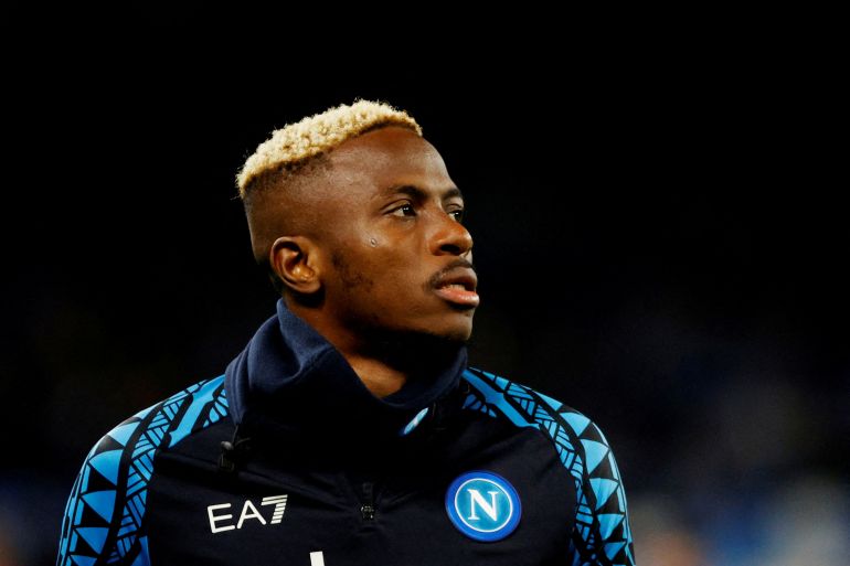 Soccer Football - Champions League - Group C - Napoli v S.C. Braga - Stadio Diego Armando Maradona, Naples, Italy - December 12, 2023 Napoli's Victor Osimhen during the warm up before the match REUTERS/Ciro De Luca REFILE - LOCATION and EVENT