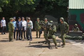 Taiwan President Lai Ching-te (4th left) watches a demonstration of a US-made Dual Mount Stinger air-defence system during a visit to inspect military troops on Penghu Islands, on September 6, 2024 [Walid Berrazeg/AFP]