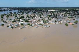 An aerial view shows houses submerged in Maiduguri during floods this week [Audu Marte/AFP]