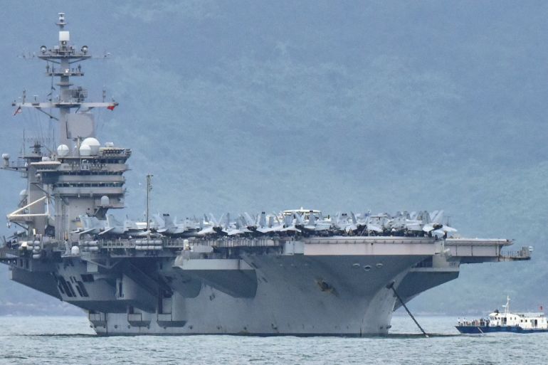 The USS Theodore Roosevelt (CVN-71) is pictured as it enters the port in Da Nang, Vietnam, March 5, 2020. REUTERS/Kham