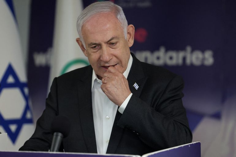 Israeli Prime Minister Benjamin Netanyahu speaks during a press conference at the Sheba Tel-HaShomer Medical Centre, in Ramat Gan on June 8, 2024 amid the ongoing conflict in the Palestinian territory between Israel and the militant group Hamas. Israel said its forces rescued four hostages alive from a Gaza refugee camp on June 8 as it intensified an assault despite scrutiny over a deadly strike on a UN-run school there. The four had been kidnapped by Hamas from the Nova music festival during the October 7 attacks that sparked the war, the army said. JACK GUEZ/Pool via REUTERS