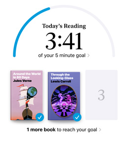 iPhone screen showing the Reading Goals interface in the Books app. At the top, there is a progress ring for a reading goal. Below the progress ring are three book covers. Beneath the book covers is text that one more book is needed to reach the 2024 goal of reading eight books.