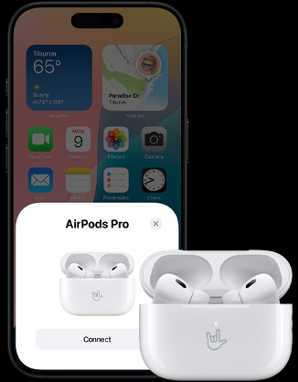 Otwarte etui ładujące z AirPods 4 w środku obok iPhone’a z komunikatem o podłączeniu AirPods 4 na ekranie.