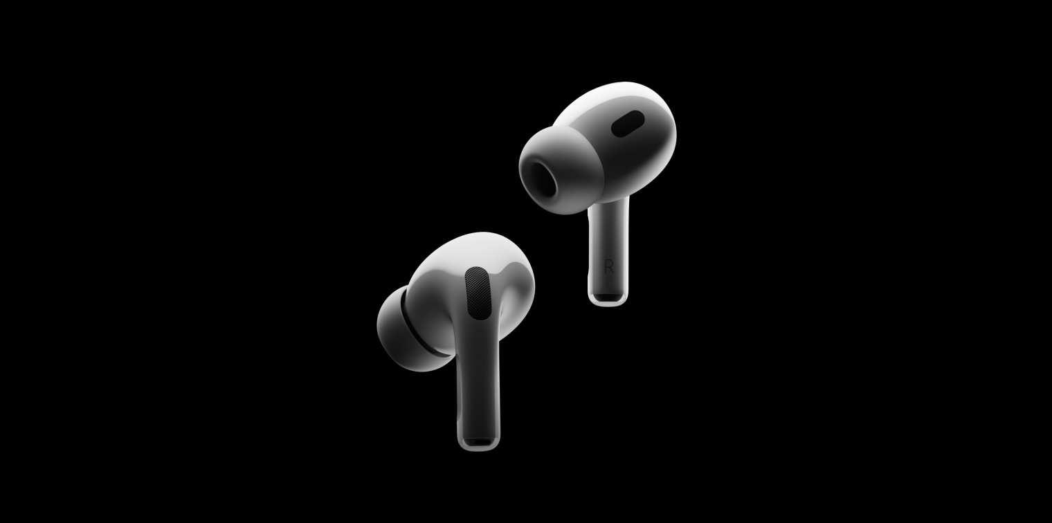 Grande plano dos AirPods Pro 2, numa vista de 360 graus.