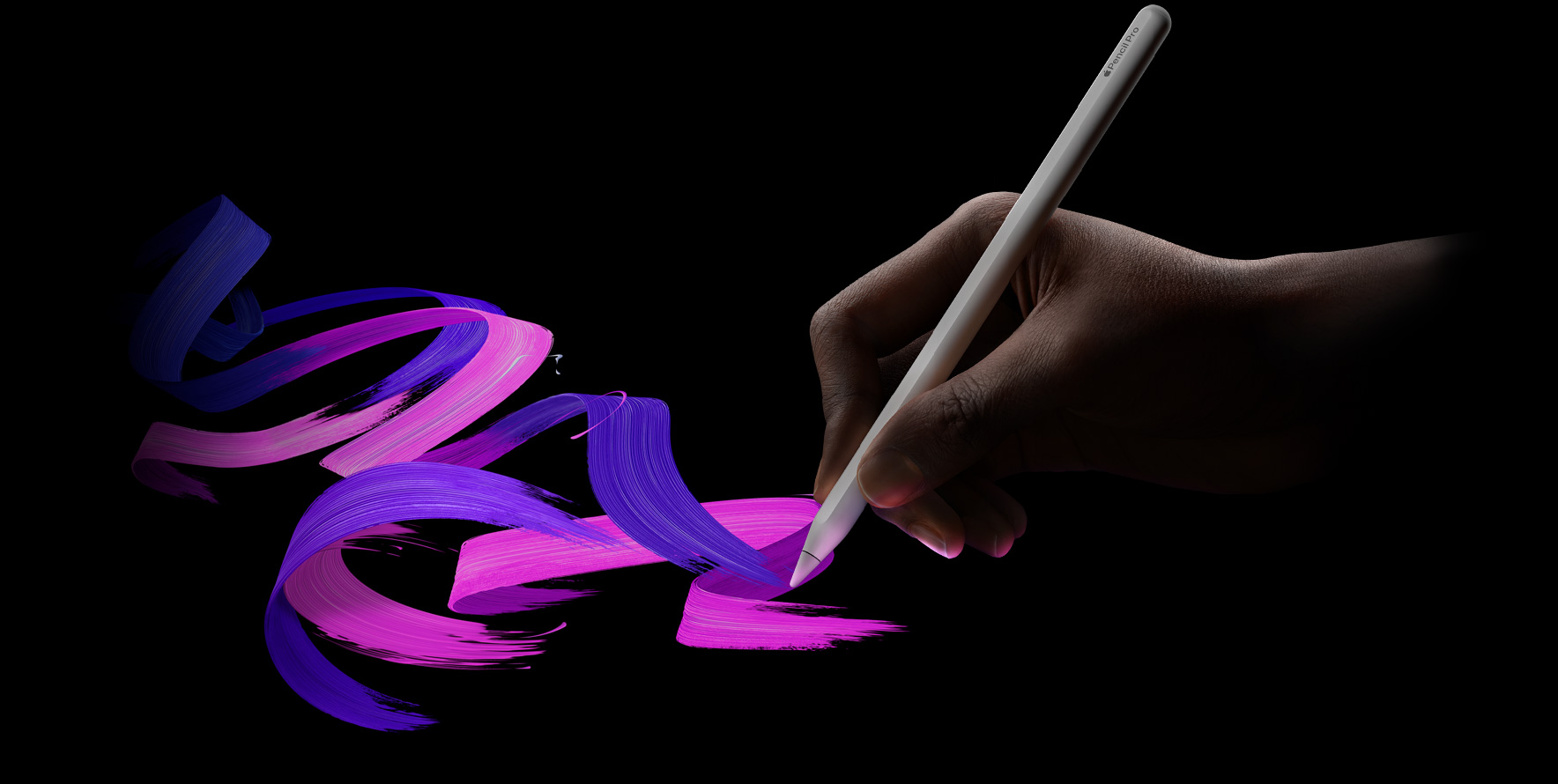 Потребител, който държи Apple Pencil Pro, следвано от плътна линия на четката