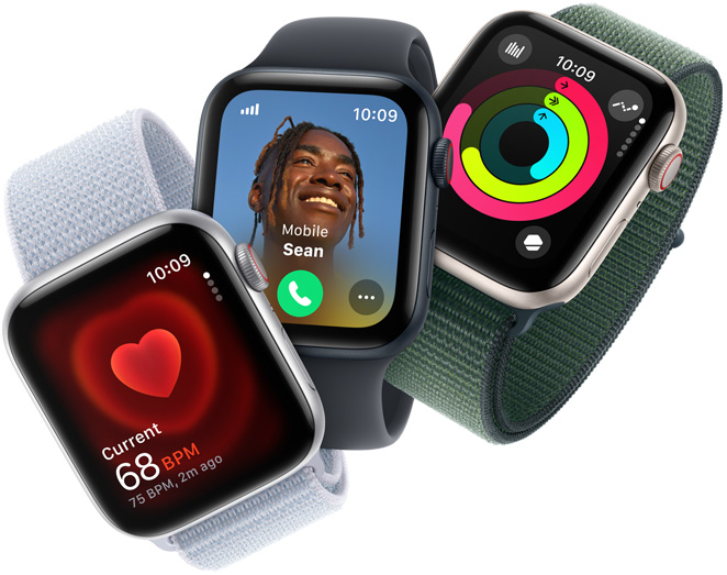 三部 Apple Watch SE 裝置，分別展示心率監測功能、來電顯示及健身記錄圓圈