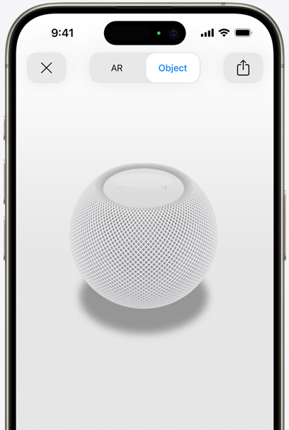 iPhone 螢幕上顯示白色 HomePod 的 AR 畫面。