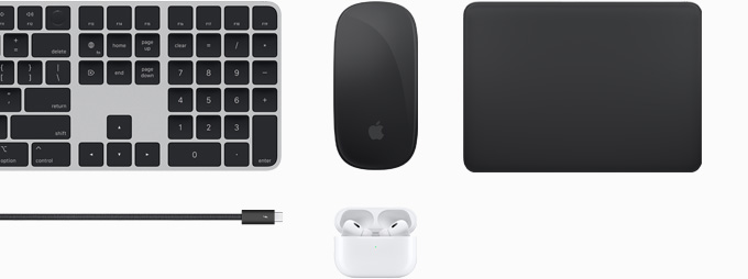 Colección de accesorios que incluyen un Magic Keyboard, Magic Mouse, Magic Trackpad, cable Thunderbolt 4 Pro y AirPods Pro.