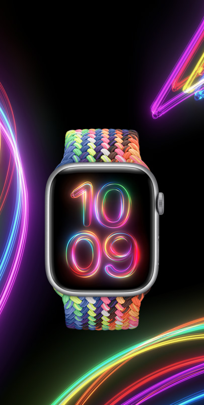 En Apple Watch Series 9 med den nya flätade Pride Edition-sololoopen i neonfärger och matchande Pride Radiance-urtavla.