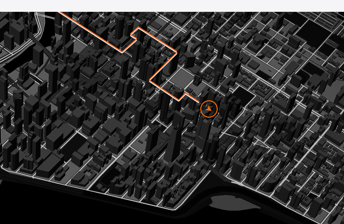 Plan d’une ville en 3D où une ligne se terminant par une flèche indique un itinéraire de course.