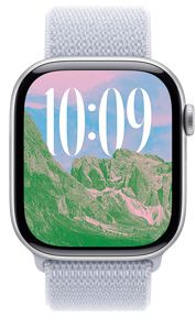 Bilder-urskiven med bilde av et landskap og tilpasset skript og størrelse på klokkeslett på Apple Watch.