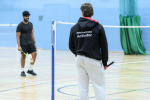 Image of men playing badminton