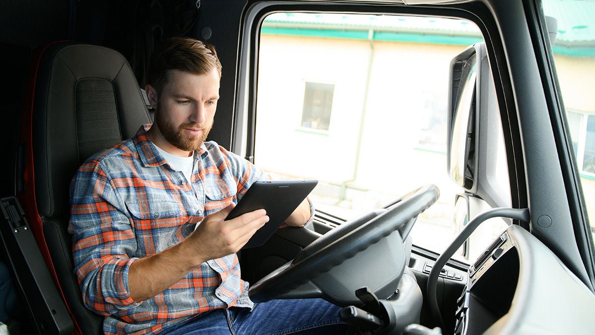 Service technician in truck