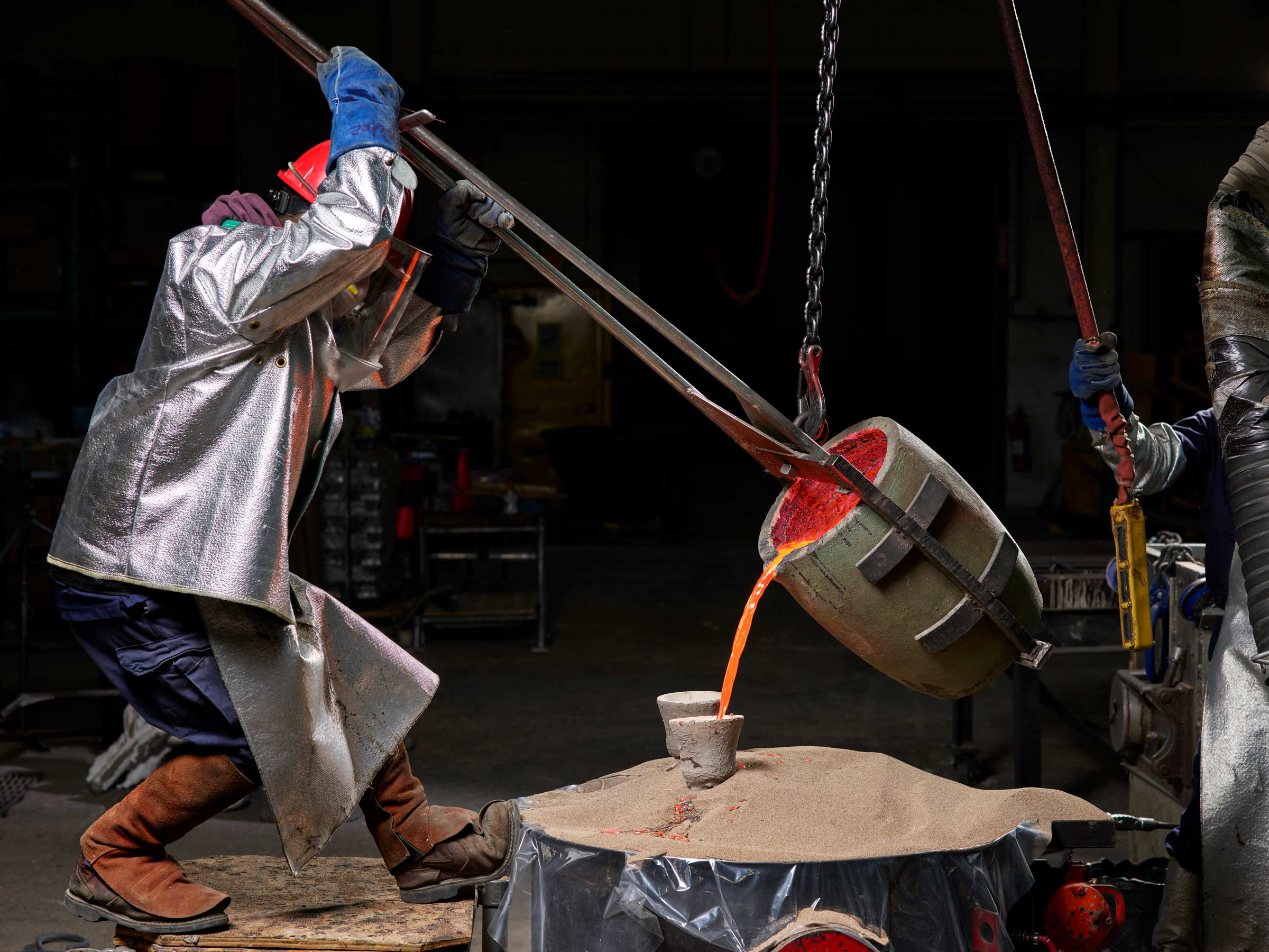 Silicon bronze is poured in, filling the hollow vessel that used to be filled with wax.