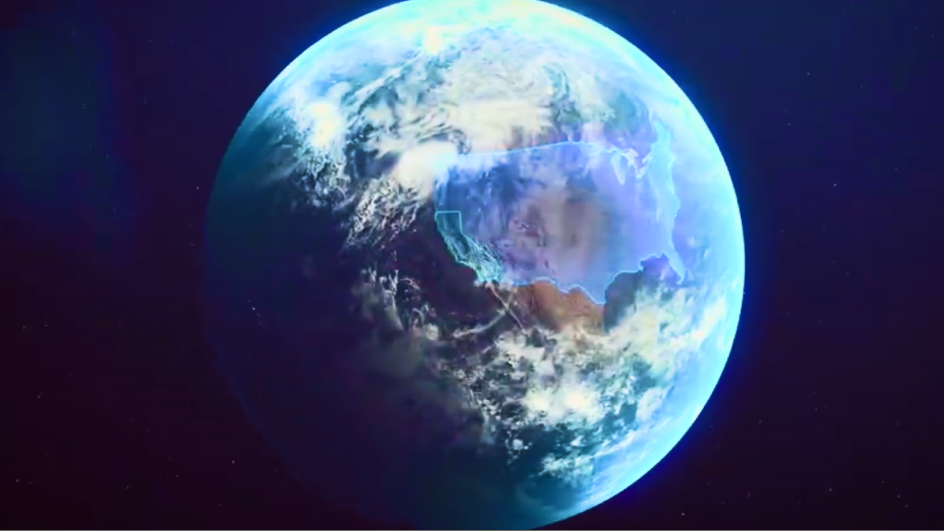 A video still showing planet Earth from space surrounded by a blue background