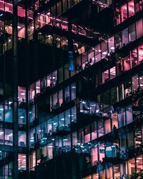 Vibrant Office Reflections at Night