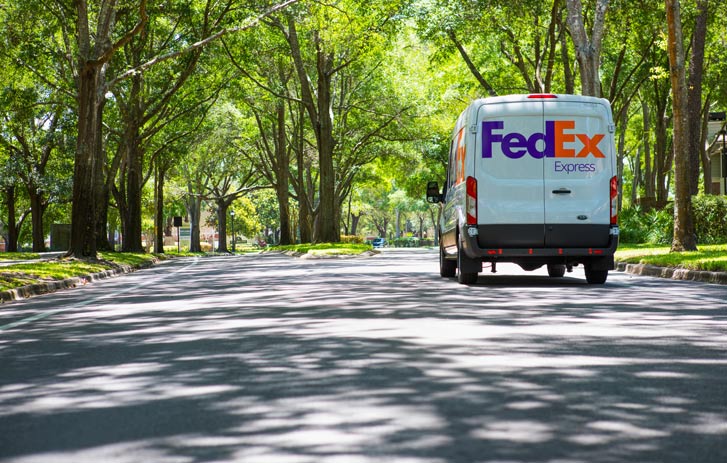 FedEx truck on road