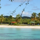 Caracas beach ocean view with bright blue sky and clear blue waters