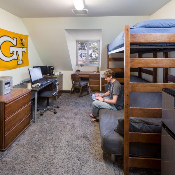 Student in dorm reading