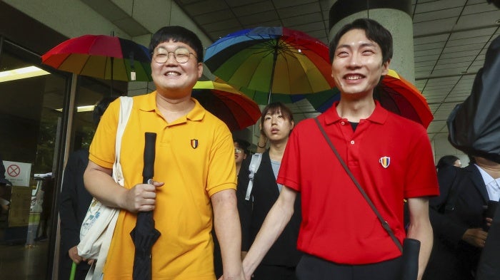 So Seong-wook, left, and Kim Yong Min leave the Supreme Court building in Seoul, South Korea, July 18, 2024.