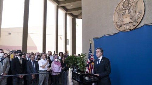 US Secretary of State Antony Blinken greets staff members at the US Embassy in Cairo, Egypt, May 26, 2021. 