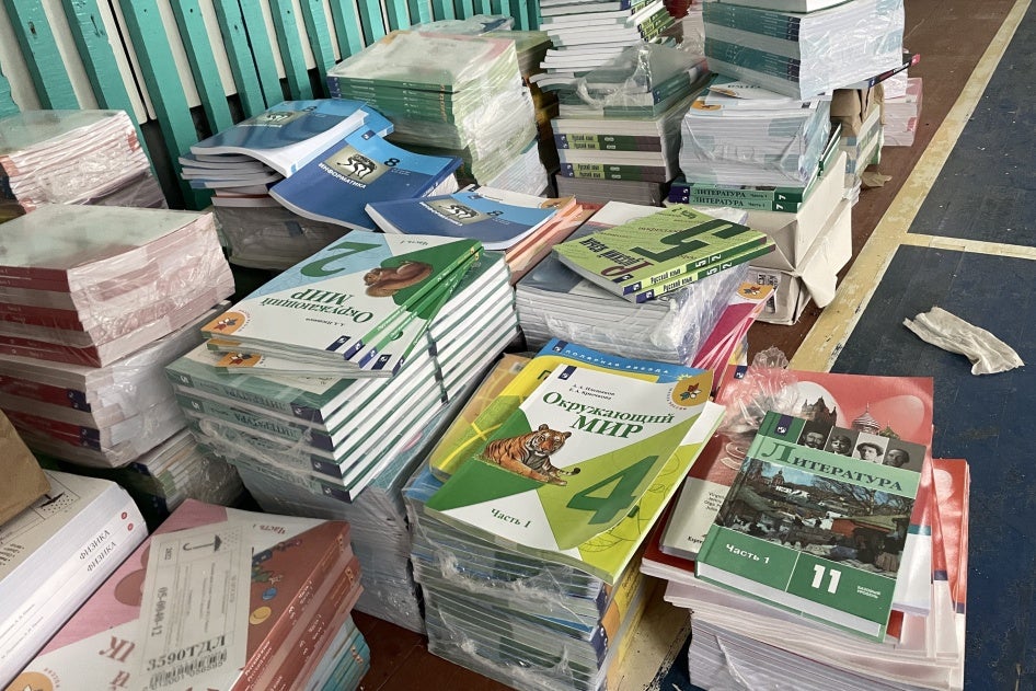 Copies of textbooks arranged on a table