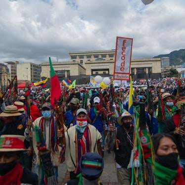 Indigenous peoples and others participate in a demonstration calling for better government protection of people in the country’s remote communities, on October 21, 2020, in Bogotá, Colombia. Indigenous people have been disproportionately affected by killings of human rights defenders in Colombia.