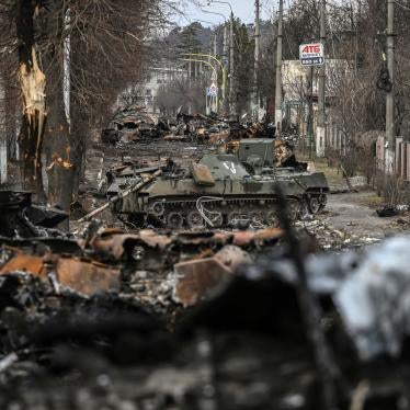 Destroyed armored vehicles on a road