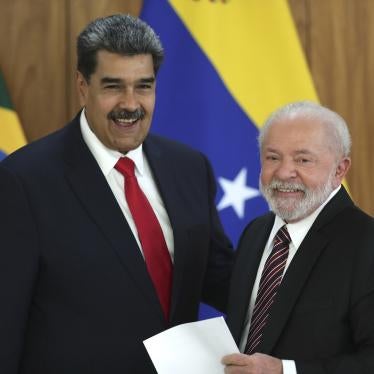 Venezuela's President Nicolas Maduro, left, and Brazilian President Luiz Inacio Lula da Silva smile at a press conference after their bilateral meeting at Planalto palace in Brasilia, Brazil, May 29, 2023. 