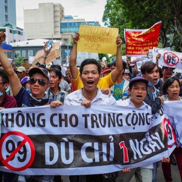 Vietnamese demonstrators protest a proposal to grant companies lengthy land leases at a march in Ho Chi Minh City, June 10, 2018.