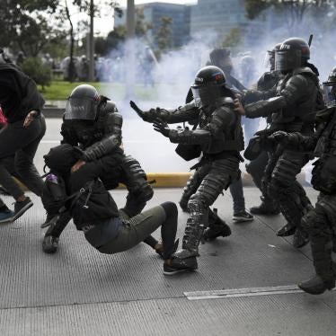 Police detain an anti-government demonstrator during a nationwide strike in Bogota, Colombia, on November 21, 2019.