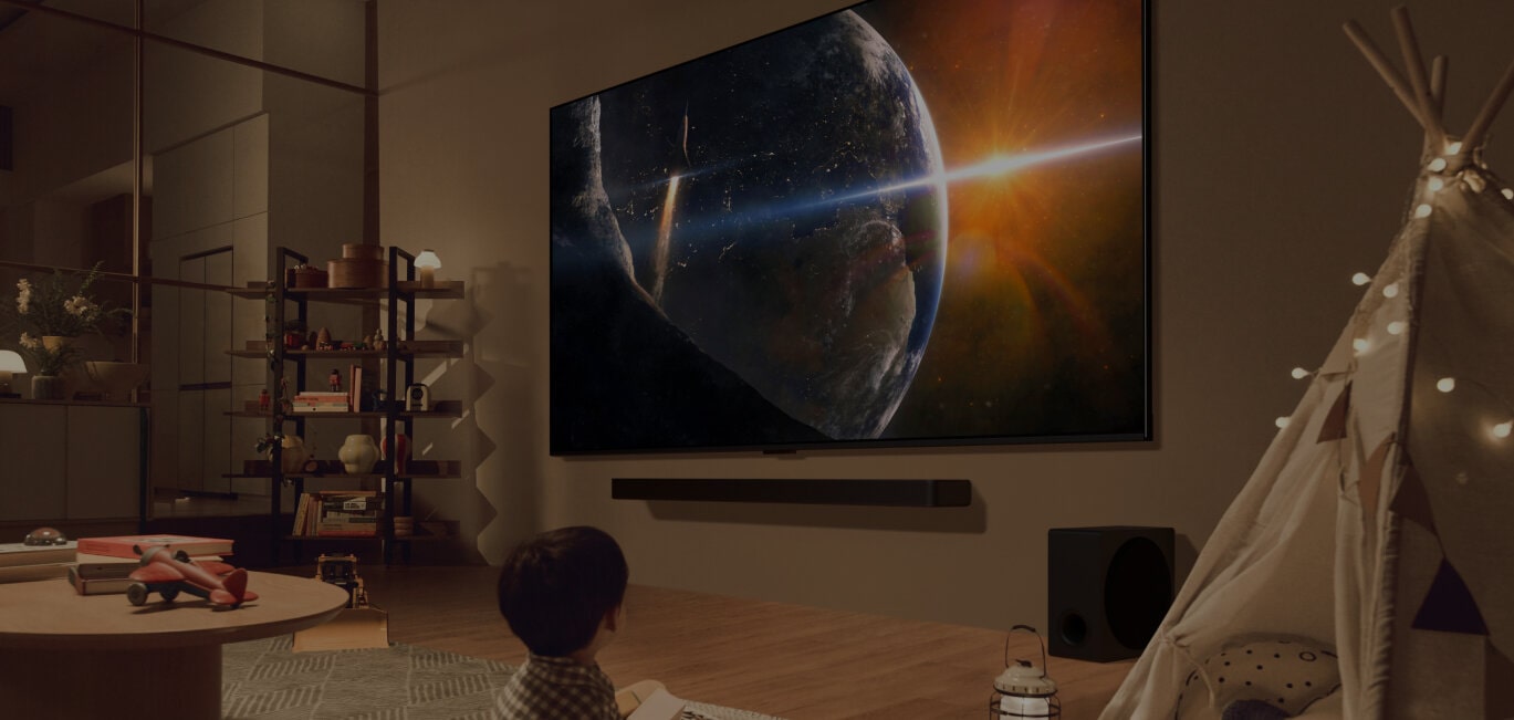 LG Soundbar image with a child sitting on the floor.