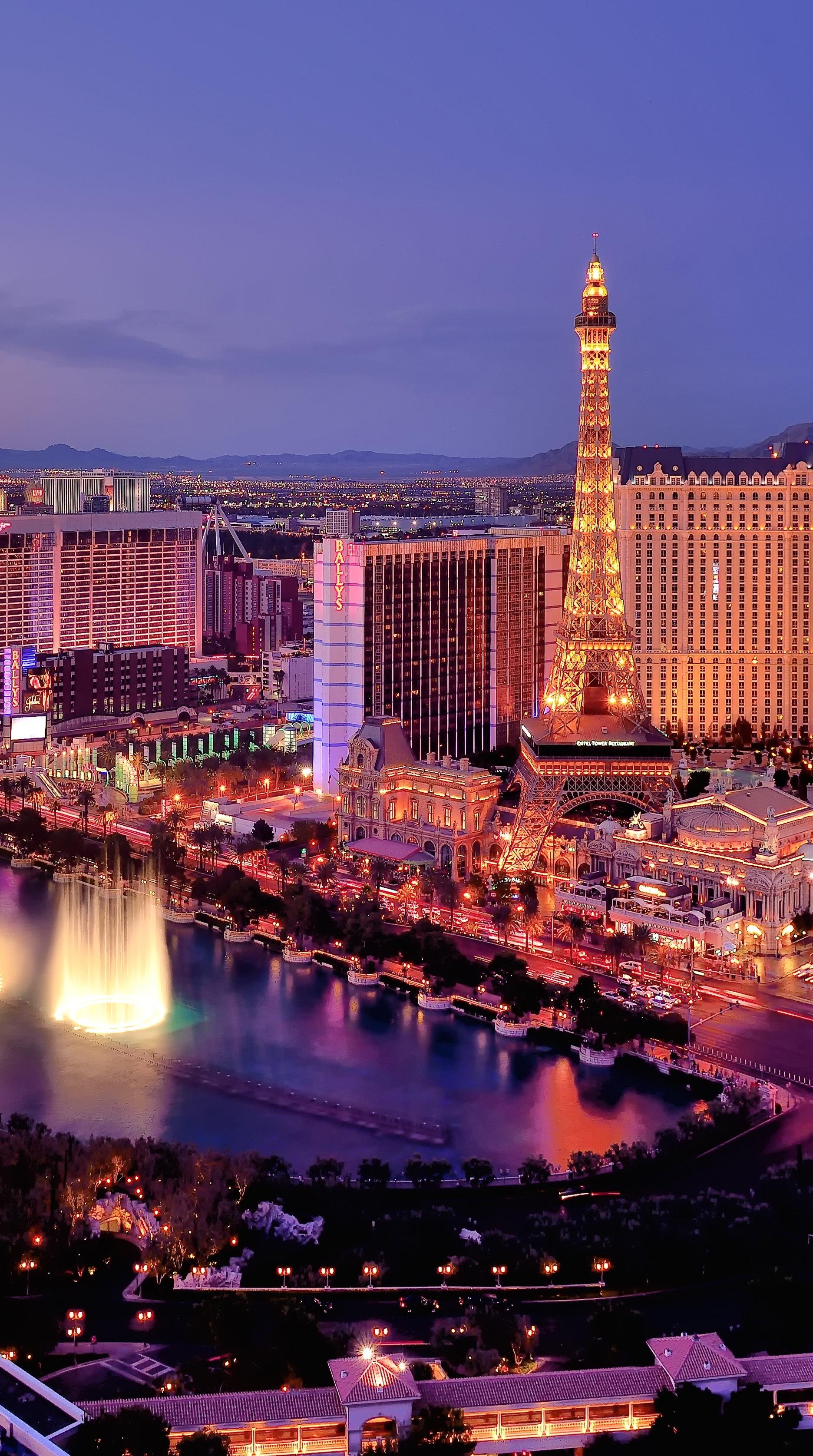 The Las Vegas Strip and skyline, lit up against the night sky 