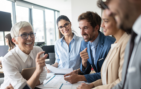 a group of people in a meeting