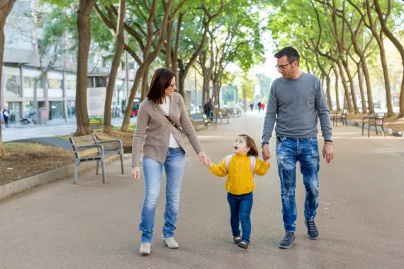 Family walking in park