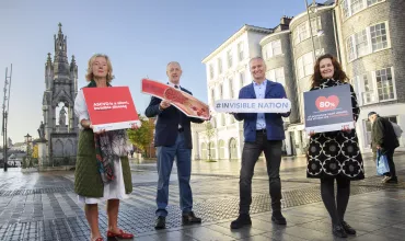 photo of people at the launch of the #invisible nation campaign