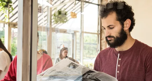 Man reading newspaper