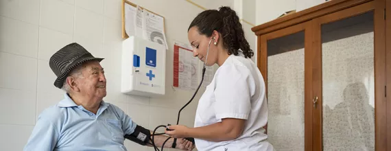 A patient gets a checkup for his diabetes 