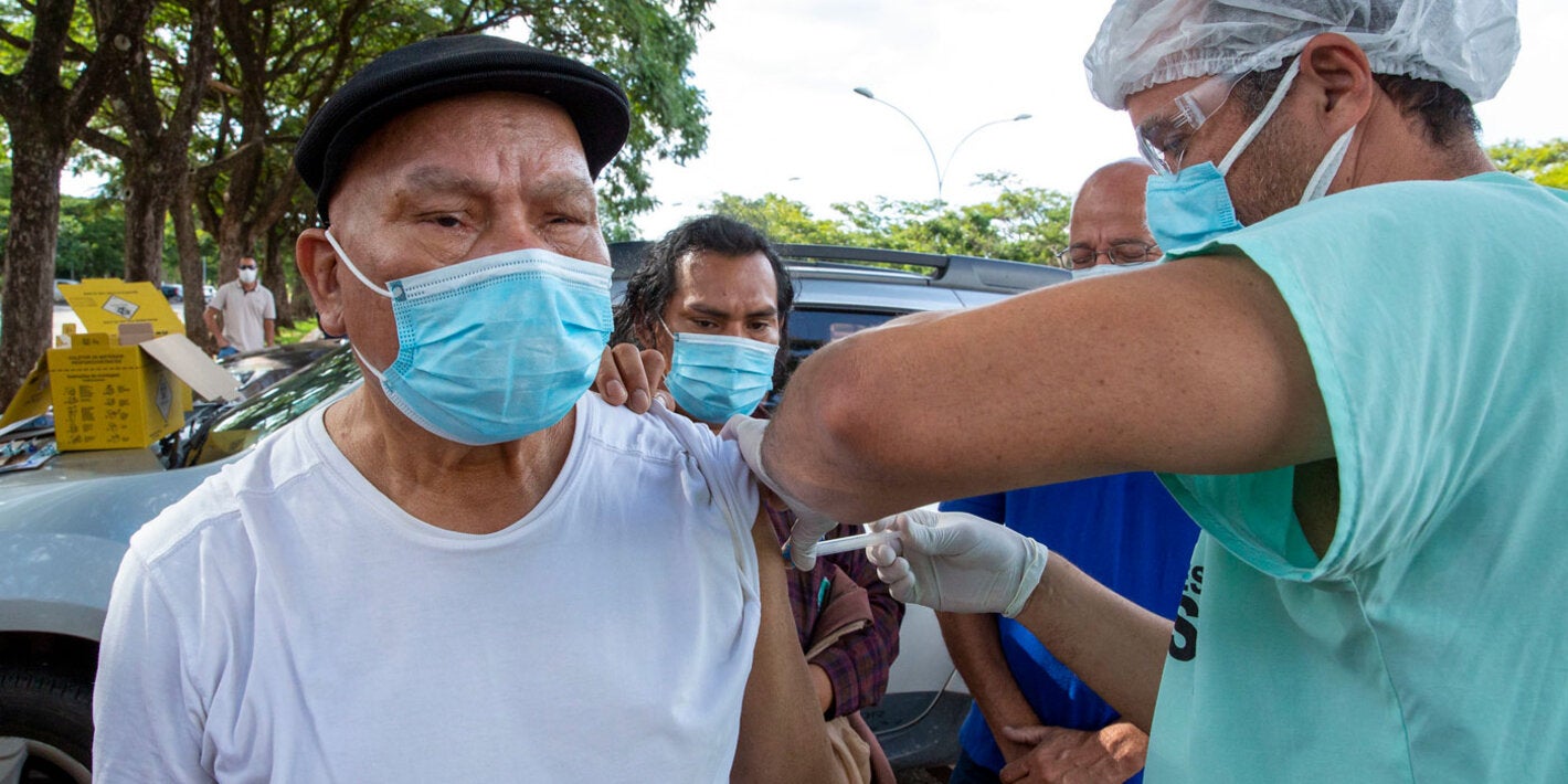 Older person receiving vaccine