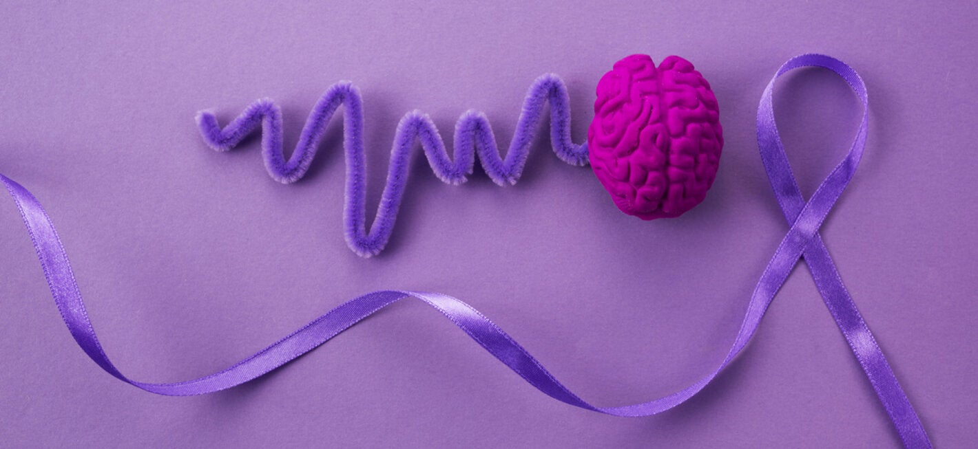 collage of items representing brain and brainwaves and a purple ribbon