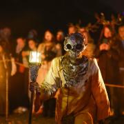 Members of the Beltane Fire Society take part in Samhuinn Fire Festival on October 31 in Edinburgh