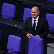 German Chancellor Olaf Scholz attends a session of the Bundestag in which new Finance Minister Joerg Kukies was sworn in the day after Scholz fired previous Finance Minister Christian Lindner