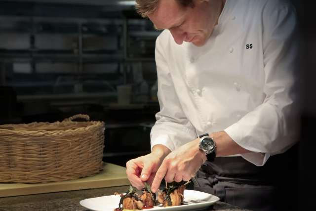 Sonny Sweetman plating food.  