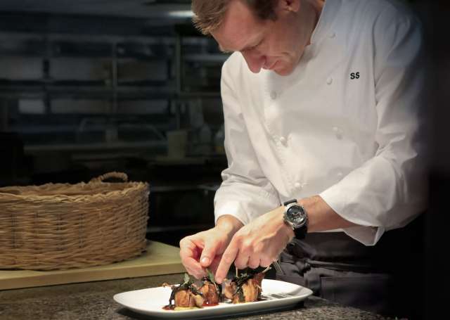 Sonny Sweetman plating food.  